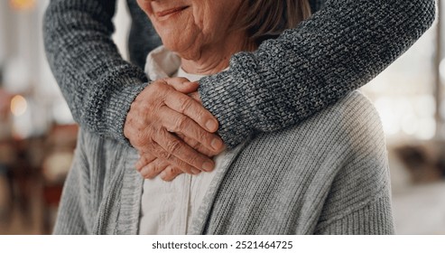 Hands, embrace and senior man with wife in home for comfort, bonding and love in marriage together. Care, empathy and closeup of elderly person hugging woman for connection in relationship at house. - Powered by Shutterstock