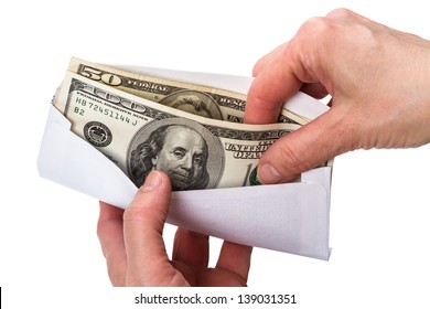 Hands And Envelope With Cash In Dollars Isolated On White Background