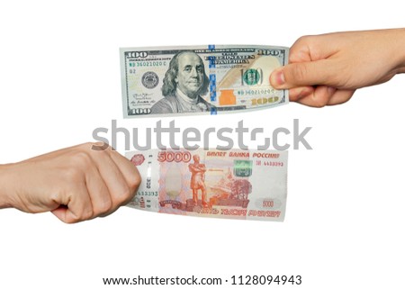 Hands exchange rubles for dollars. People exchange currency, hands transmit money. Hand holds ruble and dollar banknotes. Isolated on white background. purchase of foreign currency