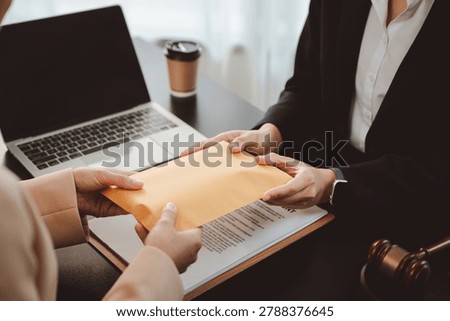 Hands exchanging a brown envelope stuffed with cash, depicting bribery and secret illegal transactions in a business or legal setting affecting governance and financial integrity