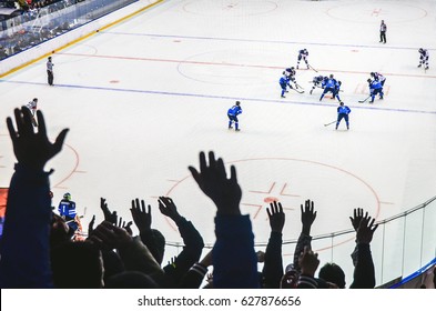 Hands Of Fans During Ice Hockey Game 