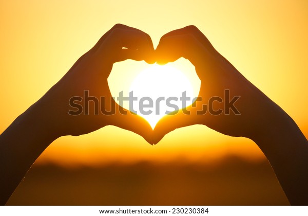 Hands Forming Heart Shape Sunset Silhouette Stock Photo (Edit Now