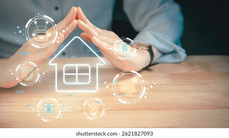 Hands forming protective gesture over smart home icon with futuristic digital interface representing home automation and security system