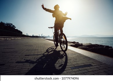 riding a bike with no hands