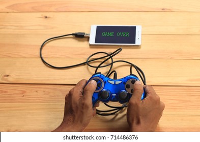 Hands with a gamepad