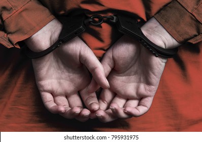 Hands of the girl in handcuffs. arrest. a crime. law. execution of sentences