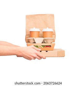 Hands Giving Food Order And Holding Pizza Box Salad Disposable Paper Cups And Paper Bag Isolated Over White Background.  