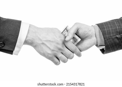 hands giving money bribe or financial support, corruption - Shutterstock ID 2154317821