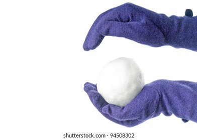 Hands In Gloves Holding Snowball