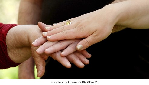 Hands Of A Grandma, Son, Daughter And Child Close-up, Hand In Hand. Next Generation Concept. Four Generation Together. 