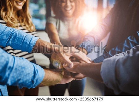 Hands, group and stack at office with support, solidarity or goals with diversity at media company. Business people, teamwork and circle with synergy, link and happy for motivation at creative agency