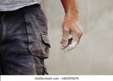 Hands of a hard working man. Close up of hands. Hard Work. Dirty working clothes.
