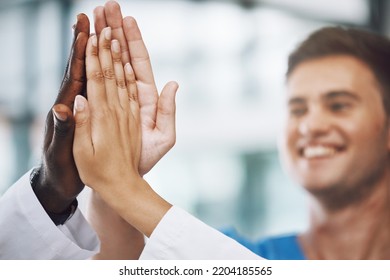 Hands, High Five And Collaboration With A Team Of A Doctor, Nurse And Health Professional Working In The Hospital. Teamwork, Motivation And Support With A Medical Group At Work In A Clinic For Care