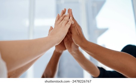 Hands, high five and diversity with teamwork and together in office for support and connection. Businesspeople, success and partnership in international company for startup, project and collaboration - Powered by Shutterstock