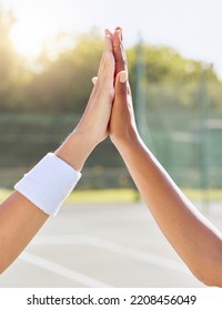 Hands, High Five And People On A Tennis Court With Motivation, Success And Partnership. Closeup Of Support, Unity And Diverse Friends On A Field For Team Building, Training Or Sports Match Win.