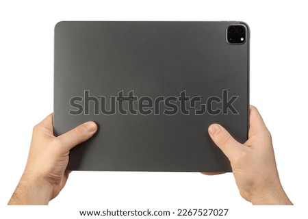Hands hold gray tablet  back rear view isolated on white studio background