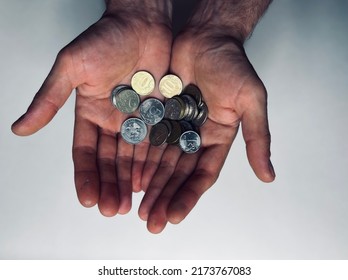 Hands Hold Iron Money. Finance, Business. Cash Back. Saving