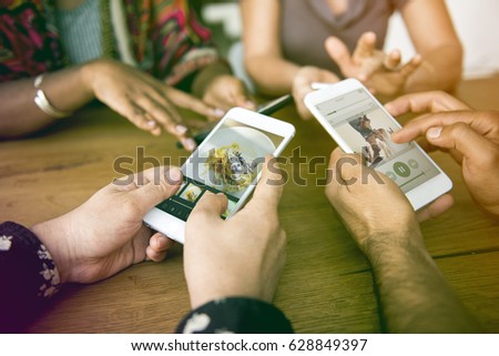 Similar – Image, Stock Photo Young hands taking photos with smartphones to vegetable skewers