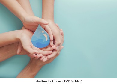 Hands Holding Clean Water Drop,world Water Day,hand Sanitizer And Hygiene, Vaccine For Covid Pandemic, Family Washing Hands, CSR, Save Water, Clean Renewable Energy