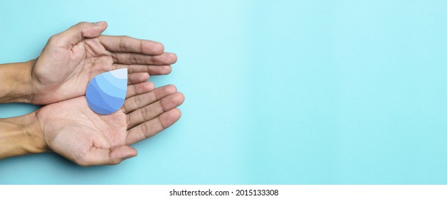 Hands Holding Clean Water Drop,world Water Day,hand Sanitizer And Hygiene, Vaccine For Covid-19 Pandemic, Family Washing Hands, CSR, Save Water, Clean Renewable Energy, Flood Disaster Relief Concept