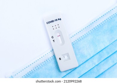 Hands Holding Covid-19 Rapid Antigen Test Cassette With Negative Result Of Rapid Diagnostic Test At Home