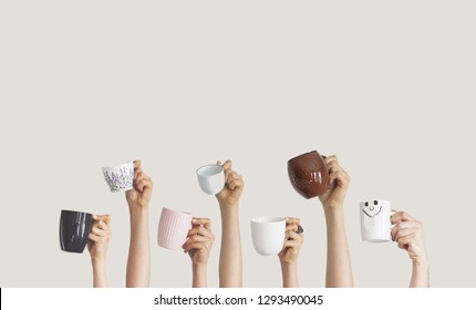 Hands holding different cup