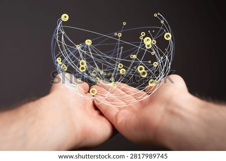 Hands holding digital network sphere, global connections concept