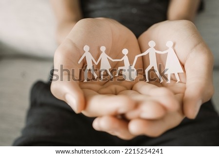 Hands holding diversity family, happpy carer and volunteer, disable nursing home, rehabilitation and health insurance concept
