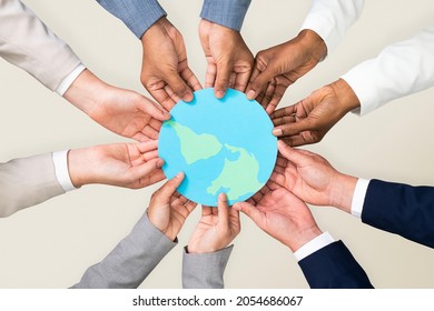 Hands Holding Earth CSR Business Campaign