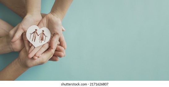 Hands holding elderly couple with walking sticks in heart shape, older people mental health, age care concept - Shutterstock ID 2171626807