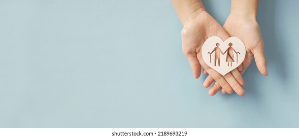 Hands holding elderly couple with walking sticks in heart shape, older people mental health, age care concept - Powered by Shutterstock