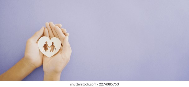 Hands holding elderly couple with walking sticks in heart shape, older people mental health, age care, retirement plan concept - Powered by Shutterstock