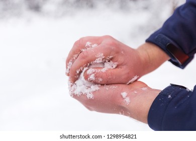 Hands Holding Fresh Snow, Man Making Snowball