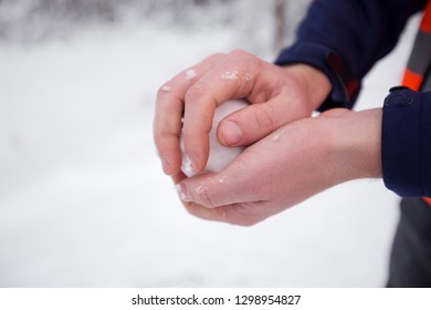 Hands Holding Fresh Snow, Man Making Snowball