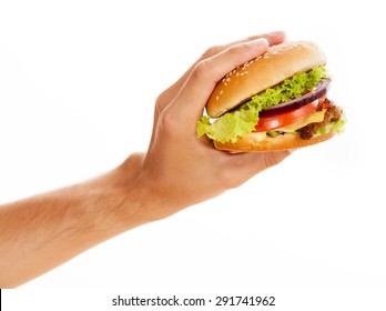 Hands holding a hamburger, isolated on white background