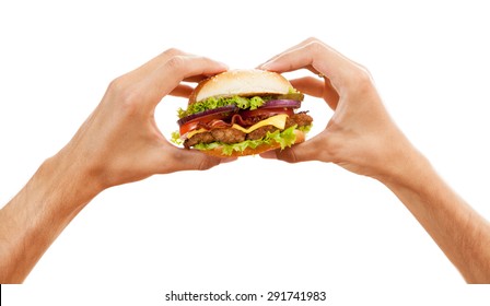 Hands Holding A Hamburger, Isolated On White Background