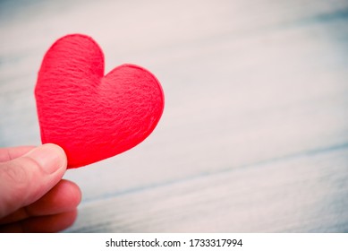 Hands Holding Heart Give Love Philanthropy Donate Help Warmth Take Care Valentines Day / Health Care Love Organ Donation Family Insurance World Health Day Hope Gratitude Covid-19 Coronavirus Relief