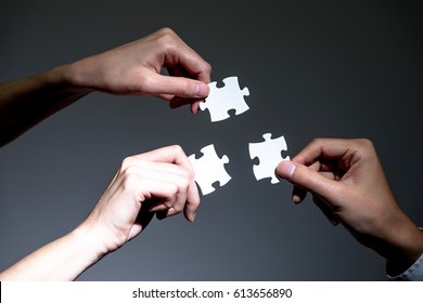 hands holding jigsaw puzzles, business to business, business matching concept - Shutterstock ID 613656890
