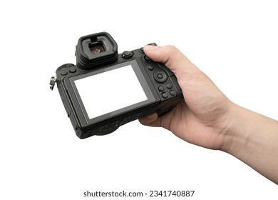 hands holding mirrorless camera on white background for checkking picture or take a photo. clipping path