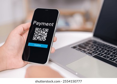 Hands holding mobile phone, Qr code payment or cashless technology concept. Coffee shop accepting digital pay without money, Meaningless QR code, Hand using mobile phone application to scan qr code. - Powered by Shutterstock - Get 15% off with code: PIKWIZARD15
