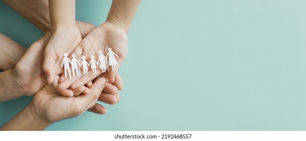 Hands holding multi generation family paper, family wellness, health insurance concept - Shutterstock ID 2192468557