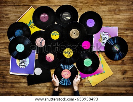 Hands holding music vinyl collectible record