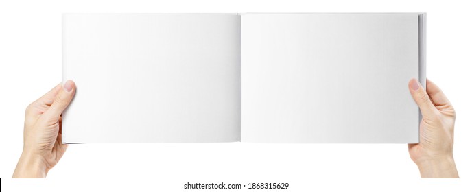 Hands holding open wide album, isolated on white background - Powered by Shutterstock