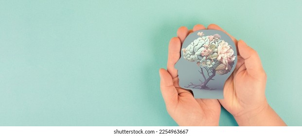 Hands holding paper head, human brain with flowers, self care and mental health concept, positive thinking, creative mind, generative AI used for brain