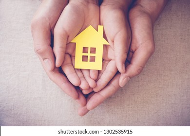 Hands Holding Paper House, Family Home, Homeless Shelter And Real Estate, Housing And Mortgage Crisis, Foster Home Care, Family Day Care, Social Distancing