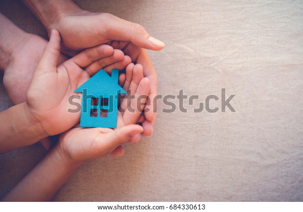 hands holding paper house, family home,
homeless shelter and real estate, housing and mortgage crisis,
foster home care, family day care, social
distancing