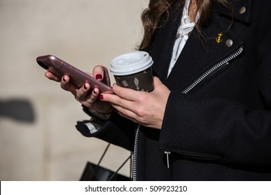 Hands Holding Phone And Coffee Street Style During Paris Fashion Week September 2016