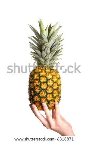 Hands holding a pineapple