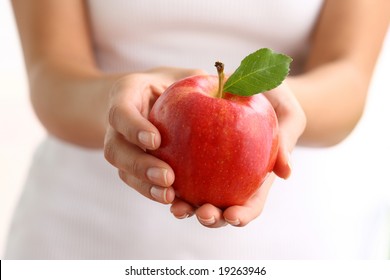 Hands Holding Red Apple