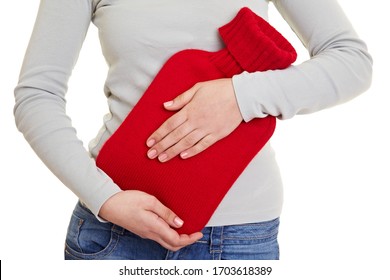 Hands Holding A Red Hot Water Bottle For Stomach Ache